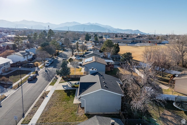 drone / aerial view featuring a residential view and a mountain view