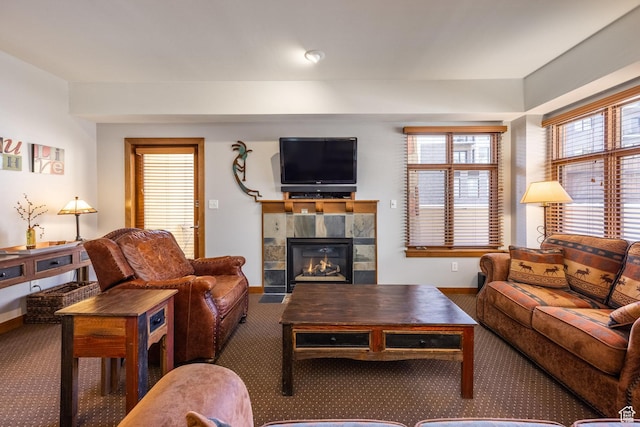 3720 N Sundial Ct Unit C007, Park City, UT 84098 - living room with carpet floors, a tile fireplace, and baseboards