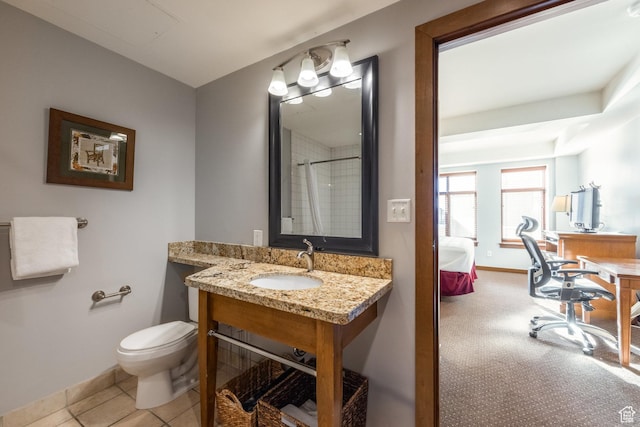 3720 N Sundial Ct Unit C007, Park City, UT 84098 - ensuite bathroom featuring toilet, vanity, ensuite bath, baseboards, and walk in shower