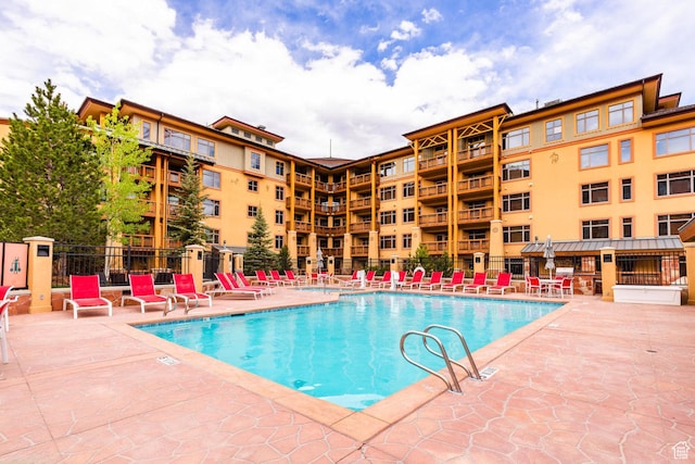 3720 N Sundial Ct Unit C007, Park City, UT 84098 - pool with a patio area and fence