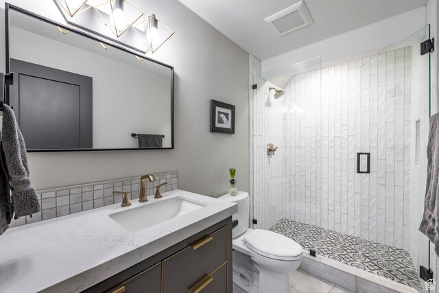 12 Thaynes Canyon Dr, Park City, UT 84060 - bathroom featuring toilet, a stall shower, visible vents, and vanity
