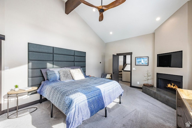 12 Thaynes Canyon Dr, Park City, UT 84060 - bedroom with beam ceiling, light carpet, high vaulted ceiling, a lit fireplace, and baseboards