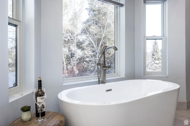 12 Thaynes Canyon Dr, Park City, UT 84060 - bathroom with a wealth of natural light, a sink, and a freestanding bath
