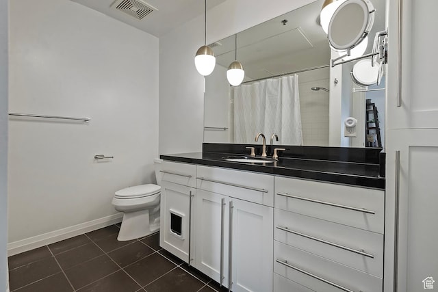 350 S 200 E Unit 404, Salt Lake City, UT 84111 - full bath featuring a shower with curtain, visible vents, toilet, tile patterned flooring, and baseboards
