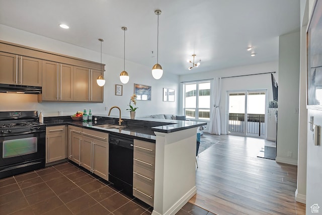 350 S 200 E Unit 404, Salt Lake City, UT 84111 - kitchen featuring dark countertops, a peninsula, under cabinet range hood, black appliances, and a sink