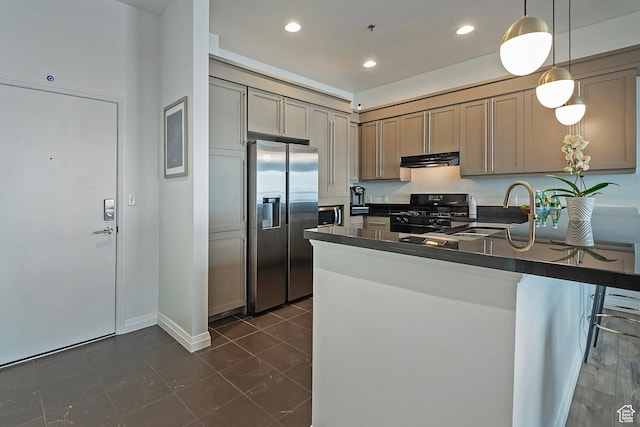 350 S 200 E Unit 404, Salt Lake City, UT 84111 - kitchen with dark countertops, gas stove, a sink, stainless steel fridge, and exhaust hood