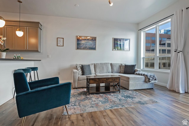 350 S 200 E Unit 404, Salt Lake City, UT 84111 - living area with baseboards and wood finished floors