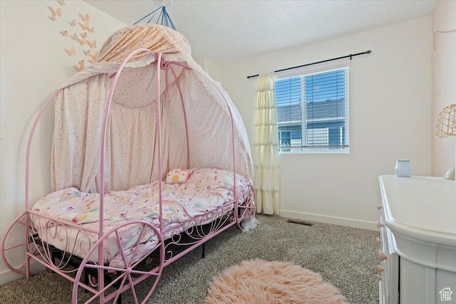 bedroom with baseboards and carpet flooring