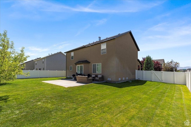 5906 Columbus Cir, Stansbury Park, UT 84074 - rear view of house with an outdoor living space, a patio, and stucco siding
