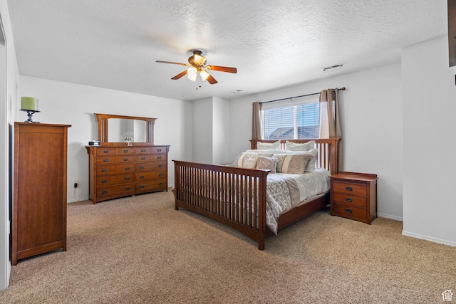 5906 Columbus Cir, Stansbury Park, UT 84074 - bedroom featuring carpet floors, a textured ceiling, ceiling fan, and baseboards