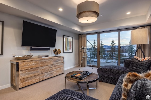 6379 W Golden Bear Loop, Park City, UT 84098 - living area with a tray ceiling, baseboards, recessed lighting, and light carpet