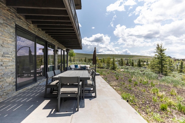 6379 W Golden Bear Loop, Park City, UT 84098 - view of patio featuring outdoor dining space and a rural view