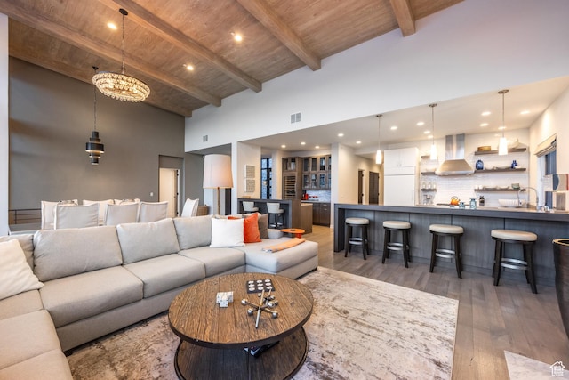 6379 W Golden Bear Loop, Park City, UT 84098 - living area featuring high vaulted ceiling, light wood-style flooring, visible vents, wooden ceiling, and beam ceiling