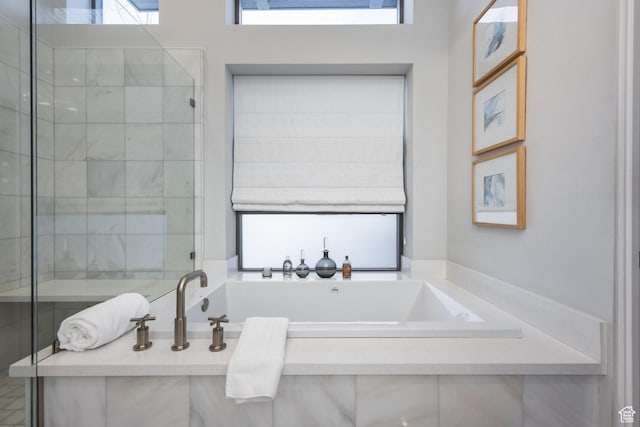 6379 W Golden Bear Loop, Park City, UT 84098 - bathroom featuring a shower stall, a bath, and a healthy amount of sunlight