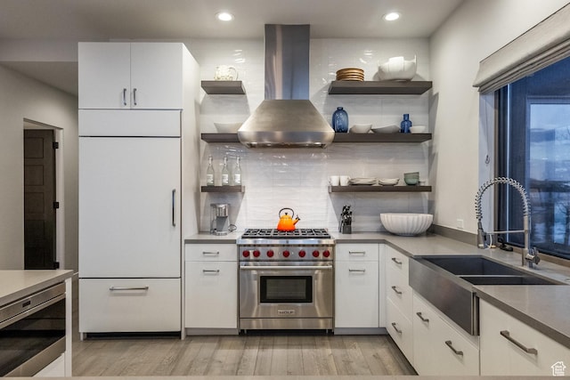 6379 W Golden Bear Loop, Park City, UT 84098 - kitchen featuring range hood, open shelves, white cabinets, a sink, and high quality appliances