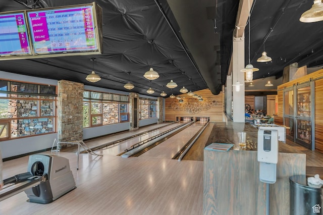 6379 W Golden Bear Loop, Park City, UT 84098 - rec room with wooden walls, wood finished floors, and a bowling alley