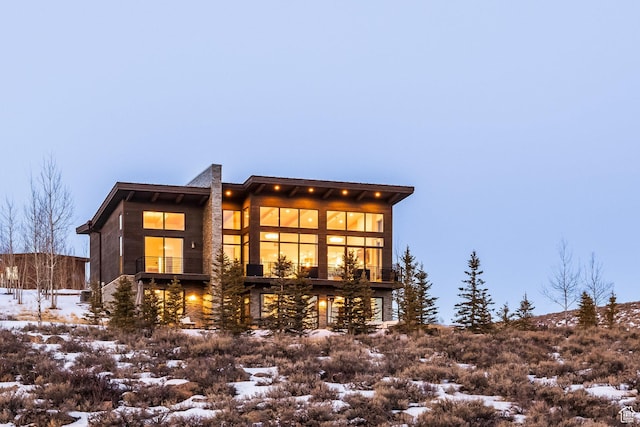 6379 W Golden Bear Loop, Park City, UT 84098 - snow covered back of property with a chimney