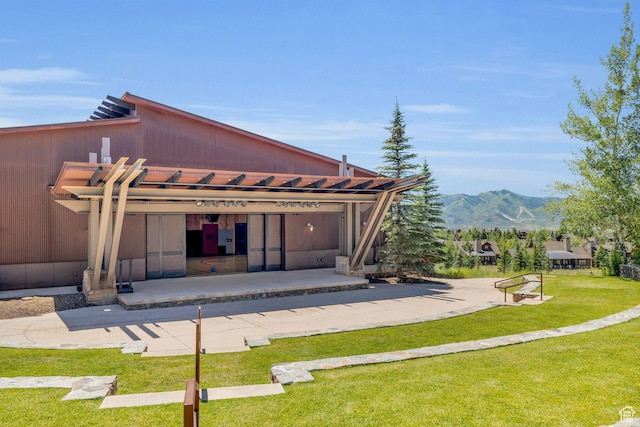 6379 W Golden Bear Loop, Park City, UT 84098 - back of house with a patio area, a mountain view, and a lawn