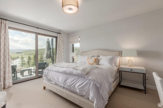 6379 W Golden Bear Loop, Park City, UT 84098 - carpeted bedroom featuring access to exterior and baseboards