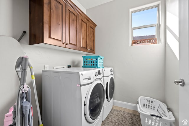529 E Dry Ln, Washington, UT 84780 - washroom featuring washing machine and dryer, cabinet space, baseboards, and light tile patterned floors