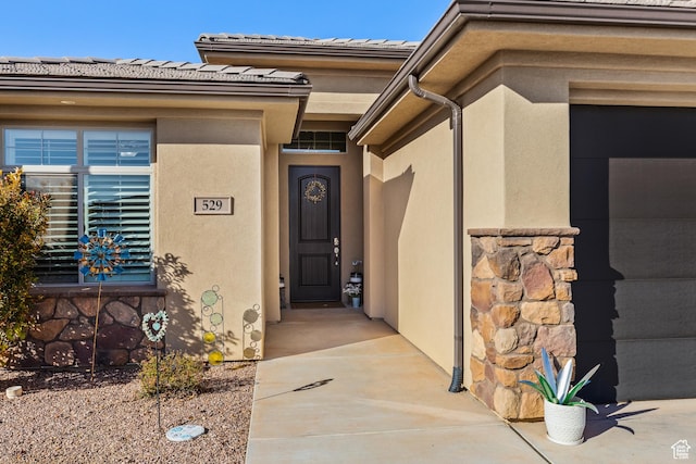 529 E Dry Ln, Washington, UT 84780 - doorway to property with stucco siding
