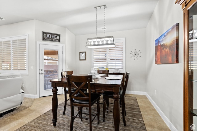 529 E Dry Ln, Washington, UT 84780 - dining area featuring light tile patterned floors and baseboards