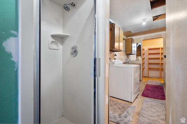 laundry room featuring cabinet space