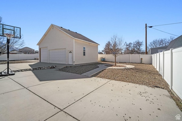 742 S 600 E, Payson, UT 84651 - view of home's exterior with a fenced backyard, an outdoor structure, and a detached garage