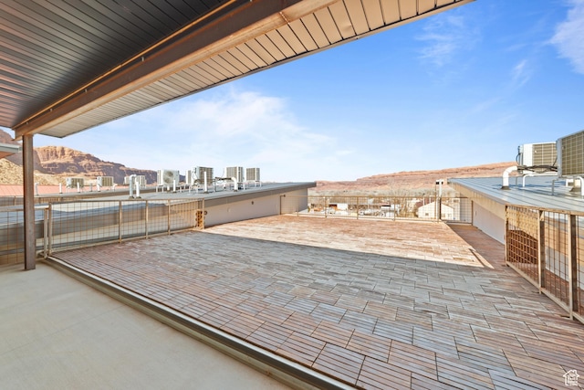 443 W Kane Blvd Unit B305, Moab, UT 84532 - view of patio featuring central AC unit and a mountain view