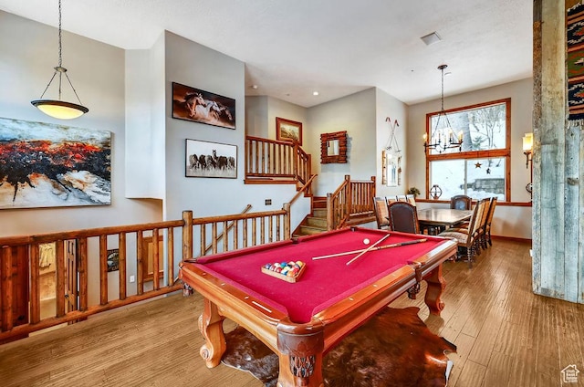 8979 N Timphaven Dr, Sundance, UT 84604 - rec room with baseboards, billiards, hardwood / wood-style floors, and an inviting chandelier