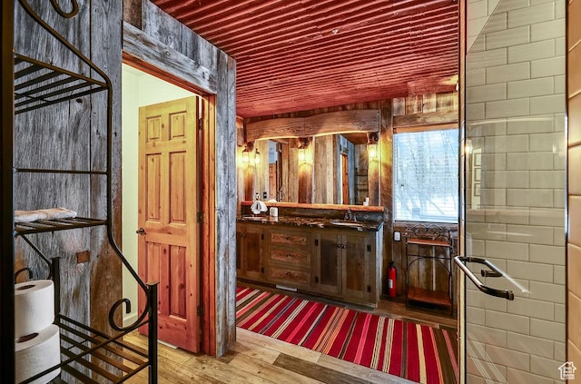 8979 N Timphaven Dr, Sundance, UT 84604 - bathroom with wooden ceiling, wood finished floors, and vanity