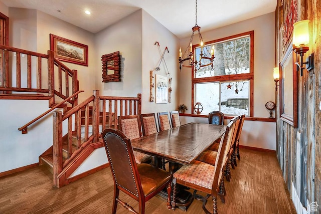 8979 N Timphaven Dr, Sundance, UT 84604 - dining room featuring a notable chandelier, recessed lighting, stairway, wood finished floors, and baseboards