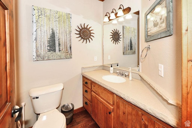 8979 N Timphaven Dr, Sundance, UT 84604 - bathroom with toilet, baseboards, wood finished floors, and vanity