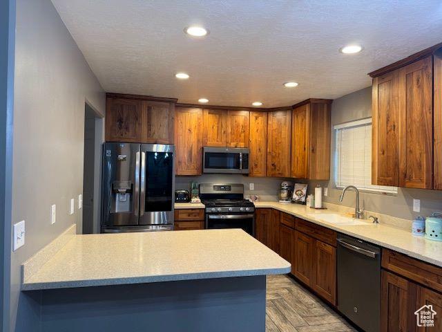 906 S 950 E, Ephraim, UT 84627 - kitchen with appliances with stainless steel finishes, light countertops, a sink, and recessed lighting