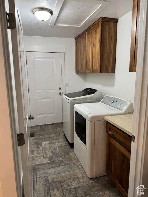 906 S 950 E, Ephraim, UT 84627 - laundry room featuring washer and clothes dryer and cabinet space