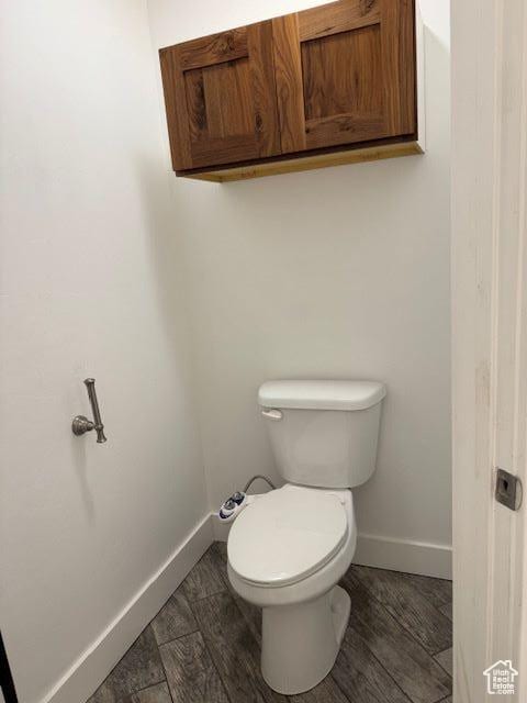 906 S 950 E, Ephraim, UT 84627 - bathroom with toilet, baseboards, and wood finished floors