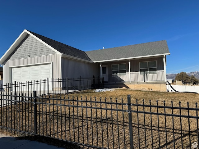 906 S 950 E, Ephraim, UT 84627 - ranch-style house featuring driveway, roof with shingles, an attached garage, covered porch, and fence