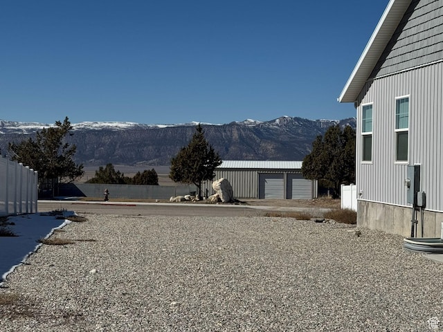 906 S 950 E, Ephraim, UT 84627 - view of yard with an outbuilding, a mountain view, and fence