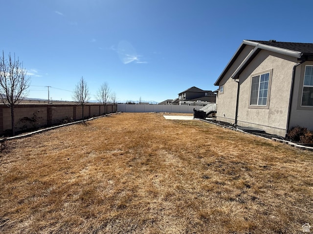 6274 N Vernon Dr E, Eagle Mountain, UT 84005 - view of yard featuring a fenced backyard