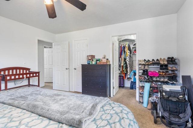 4160 S Oak Meadows Dr W Unit 11, Taylorsville, UT 84123 - bedroom with ceiling fan, a closet, a walk in closet, and carpet flooring