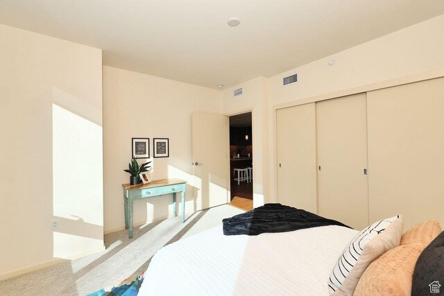 35 E 100 S Unit 1109, Salt Lake City, UT 84111 - carpeted bedroom with visible vents and a closet