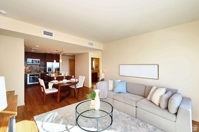 35 E 100 S Unit 1109, Salt Lake City, UT 84111 - living area featuring visible vents and dark wood finished floors