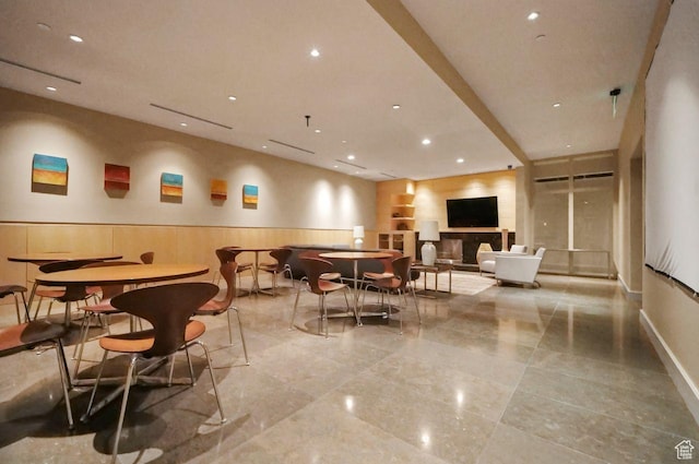 35 E 100 S Unit 1109, Salt Lake City, UT 84111 - interior space with recessed lighting, a wainscoted wall, and a fireplace