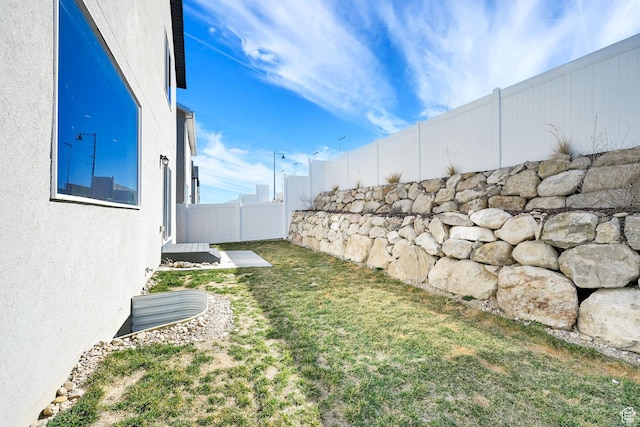 view of yard with fence