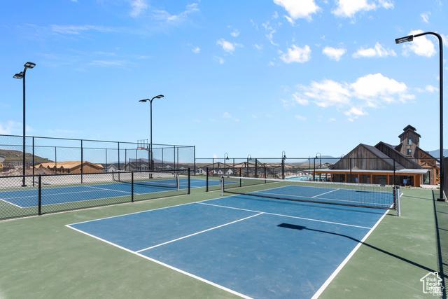 view of sport court with fence