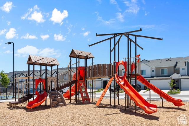 community jungle gym with a residential view