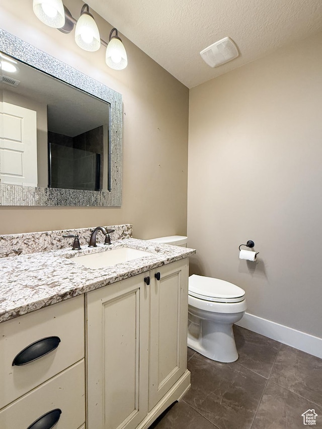 1663 N 3500 W, Plain City, UT 84404 - full bath featuring visible vents, a textured ceiling, vanity, and toilet