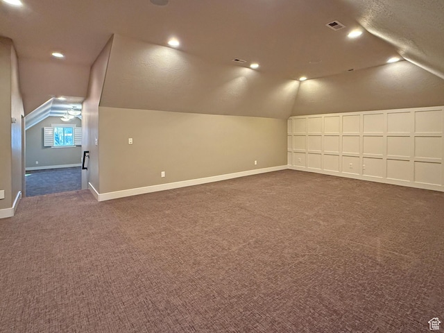 1663 N 3500 W, Plain City, UT 84404 - bonus room featuring baseboards, visible vents, lofted ceiling, dark colored carpet, and recessed lighting