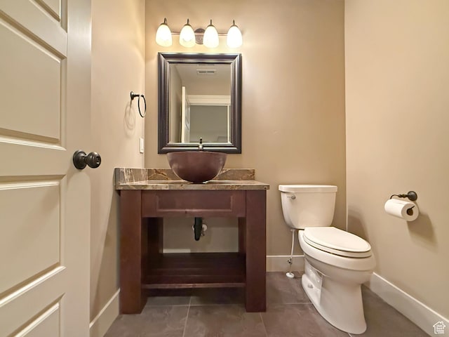 1663 N 3500 W, Plain City, UT 84404 - half bath with baseboards, vanity, toilet, and tile patterned floors