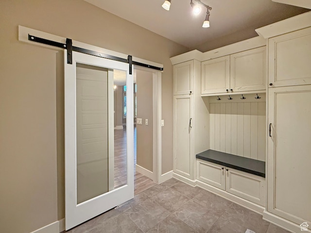 1663 N 3500 W, Plain City, UT 84404 - mudroom with a barn door and baseboards